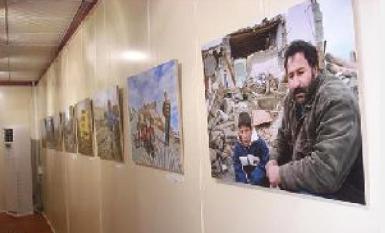 Эрбильский фотограф открыл выставку, посвященную страданиям ванцев