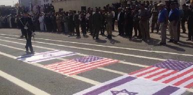Иракские шииты промаршировали по флагам США и Израиля