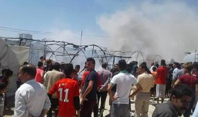 Пожар в лагере для беженцев в Дохуке