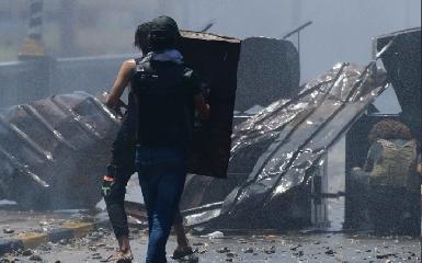 Столкновения протестующих и полиции в Наджафе