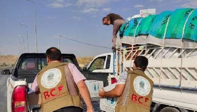 Курдский фонд и "WEO" доставили средства гигиены в лагерь беженцев в Эрбиле