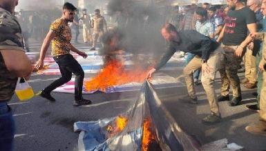 Ополченцы "Хашд аш-Шааби" сожгли израильские и американские флаги в Киркуке